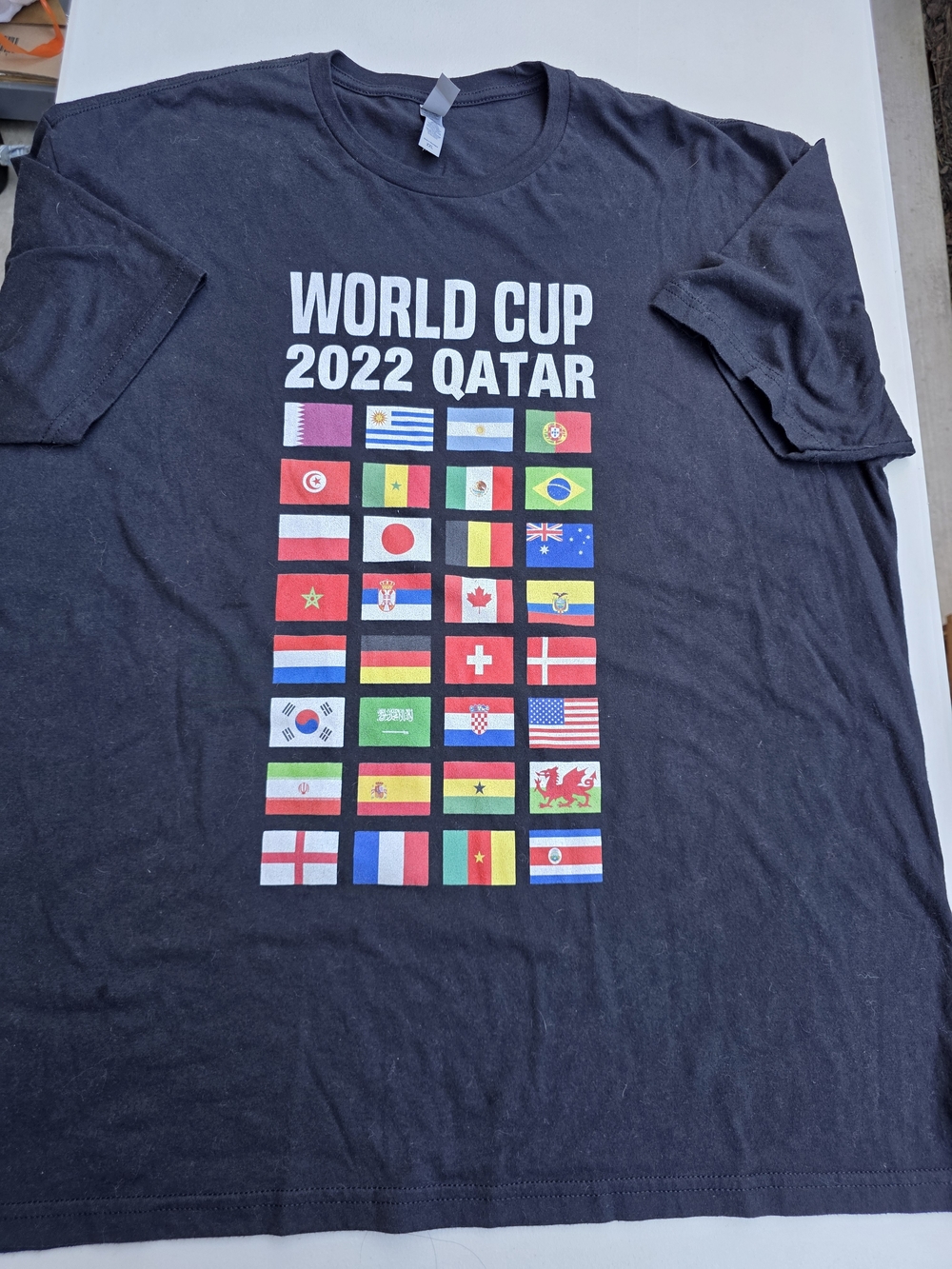 Next Level Apparel Black World Cup 2022 Qatar Flag Graphic Tee